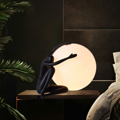 Humanoid Ball Holding Table Lamp