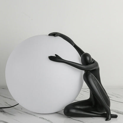 Humanoid Ball Holding Table Lamp