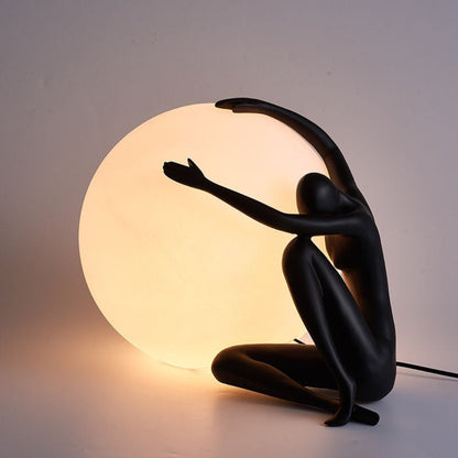 Humanoid Ball Holding Table Lamp